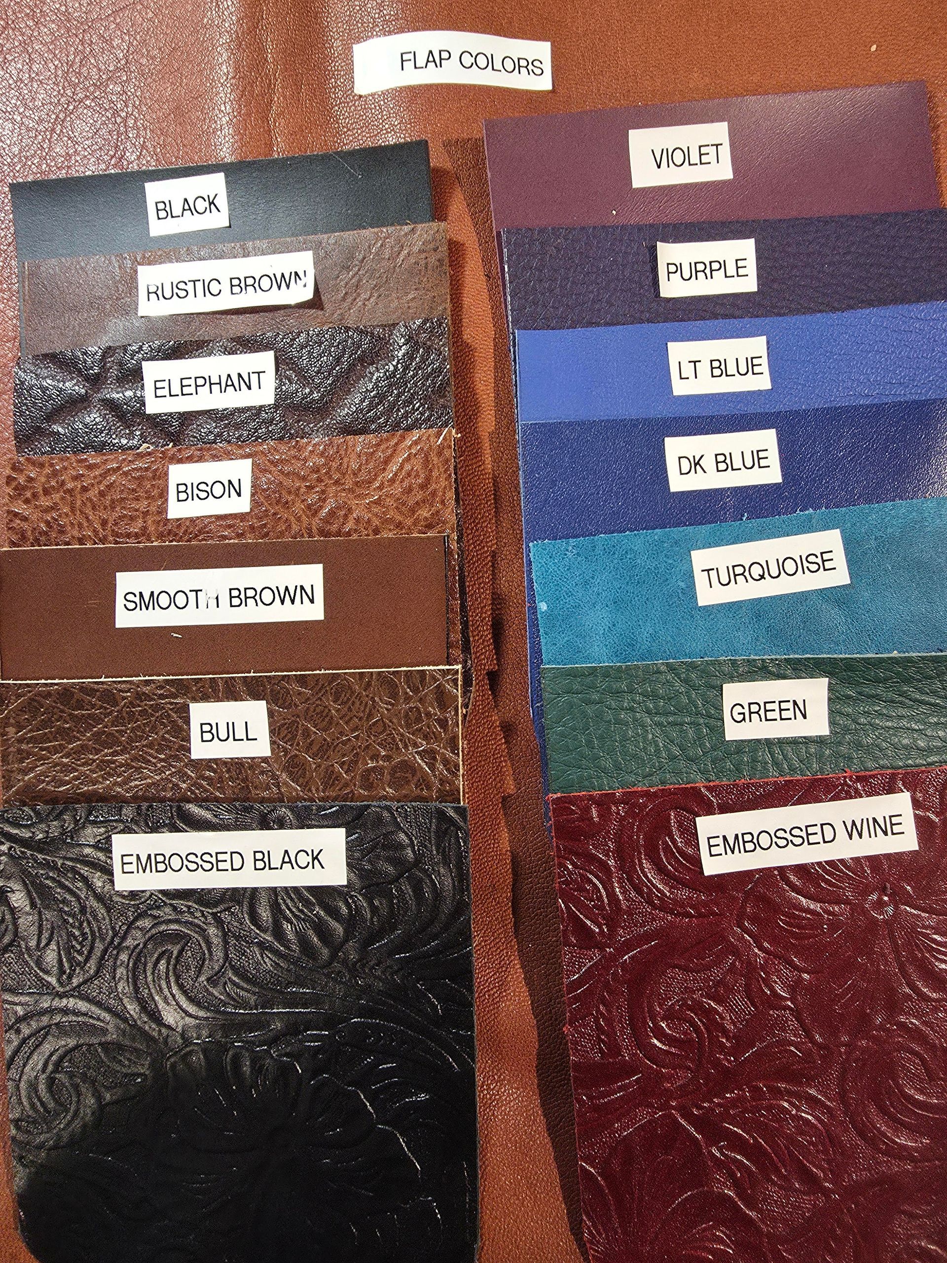 A display of fabric swatches arranged in two columns, labeled with various colors and textures like black, brown, and blue.