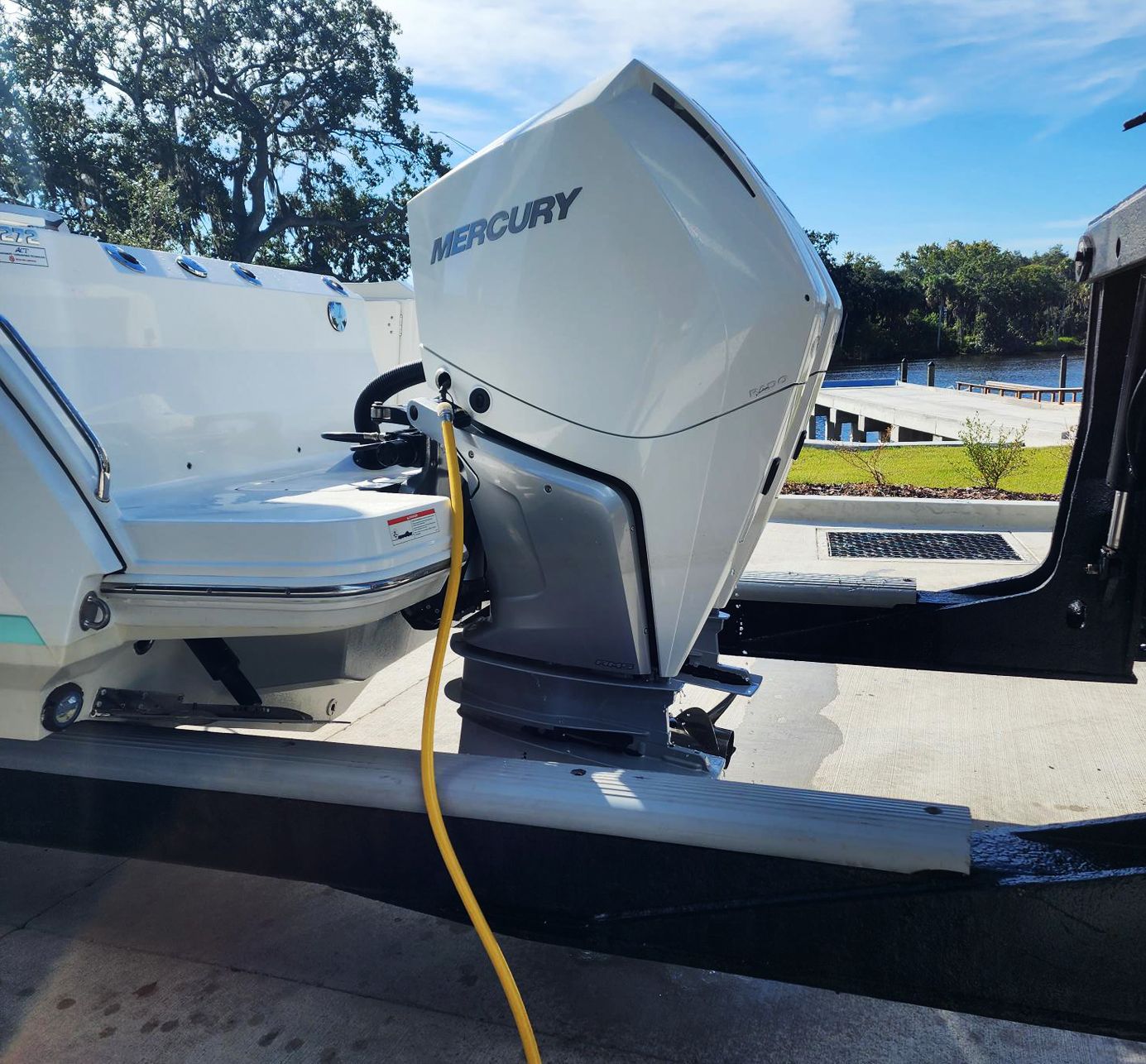 A mercury outboard motor is attached to a boat at Riverview Marina