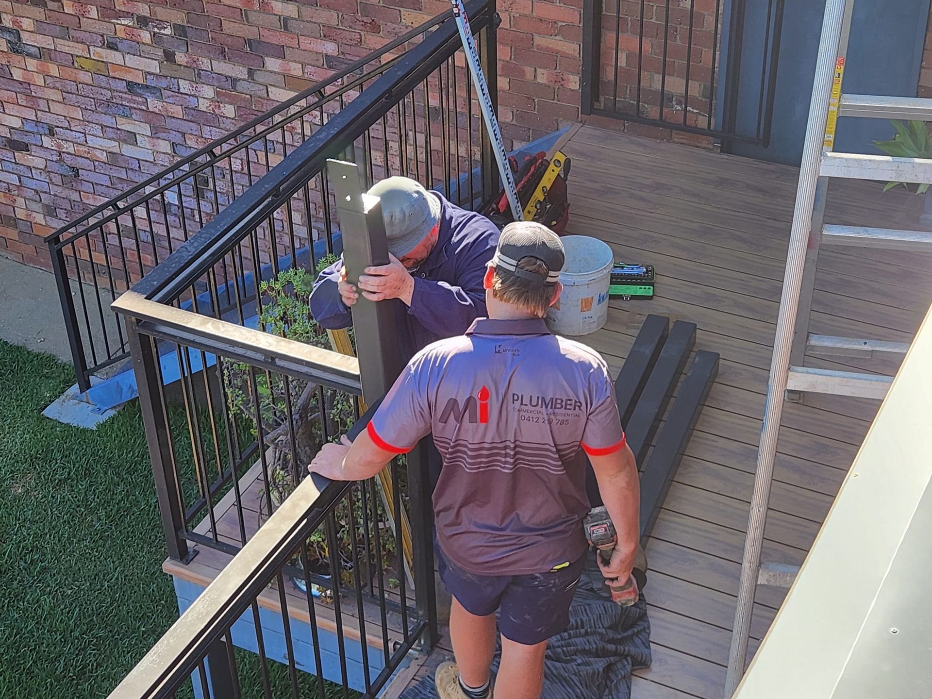 Two Workers Are Working — Mi Plumber Wagga Wagga in Lake Albert, NSW