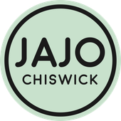 Logo for JAJO Chiswick: black text on a light green circle, surrounded by a black border.