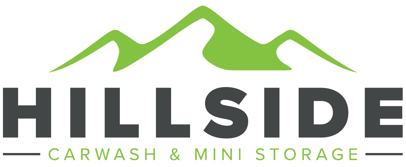 Logo for Hillside Carwash & Mini Storage: green mountain above dark gray text, with tagline.