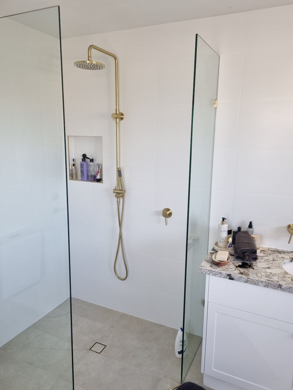 A Bathroom with A Walk in Shower and A Sink — Origin Plumbing & Gas in Mullumbimby, NSW