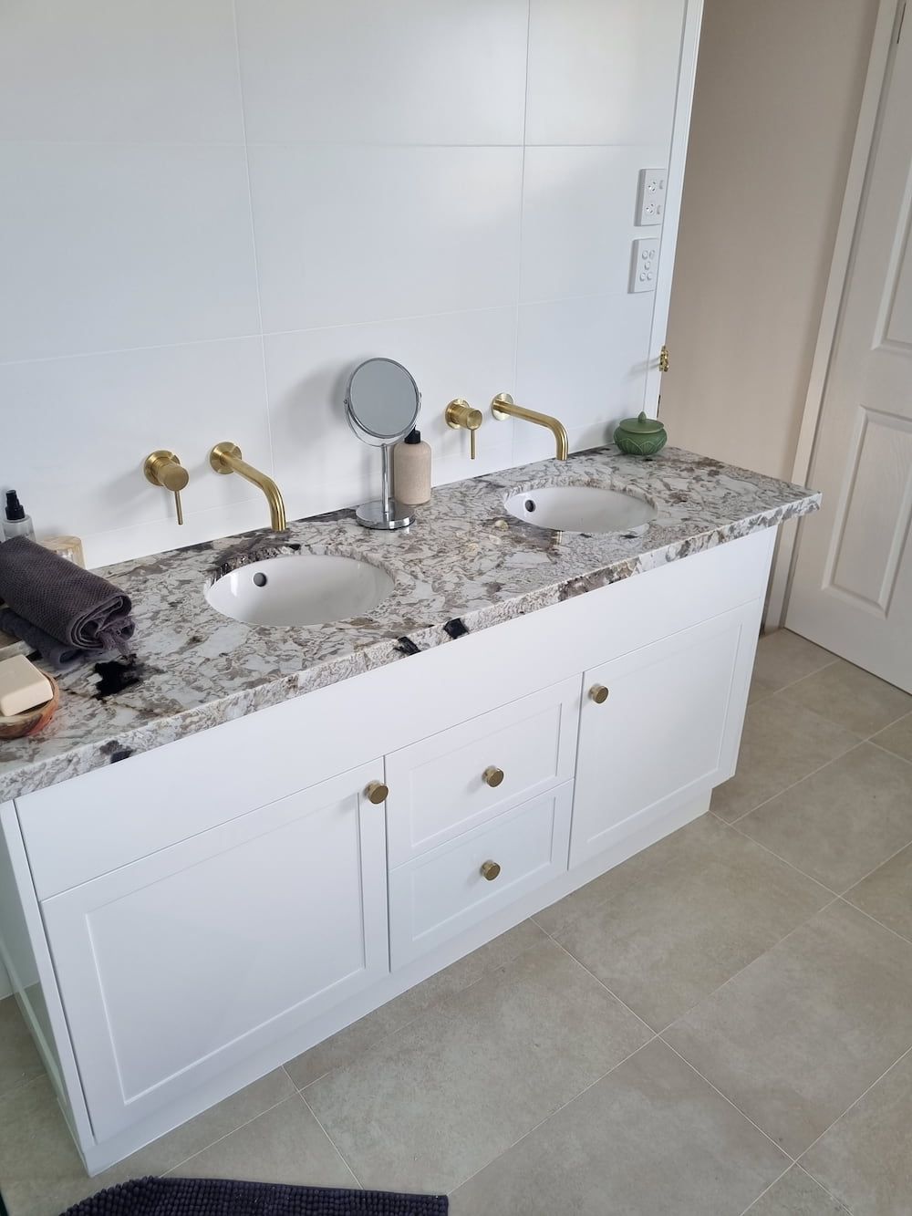 A Bathroom with Two Sinks and A Mirror on The Counter — Origin Plumbing & Gas in Lismore, NSW