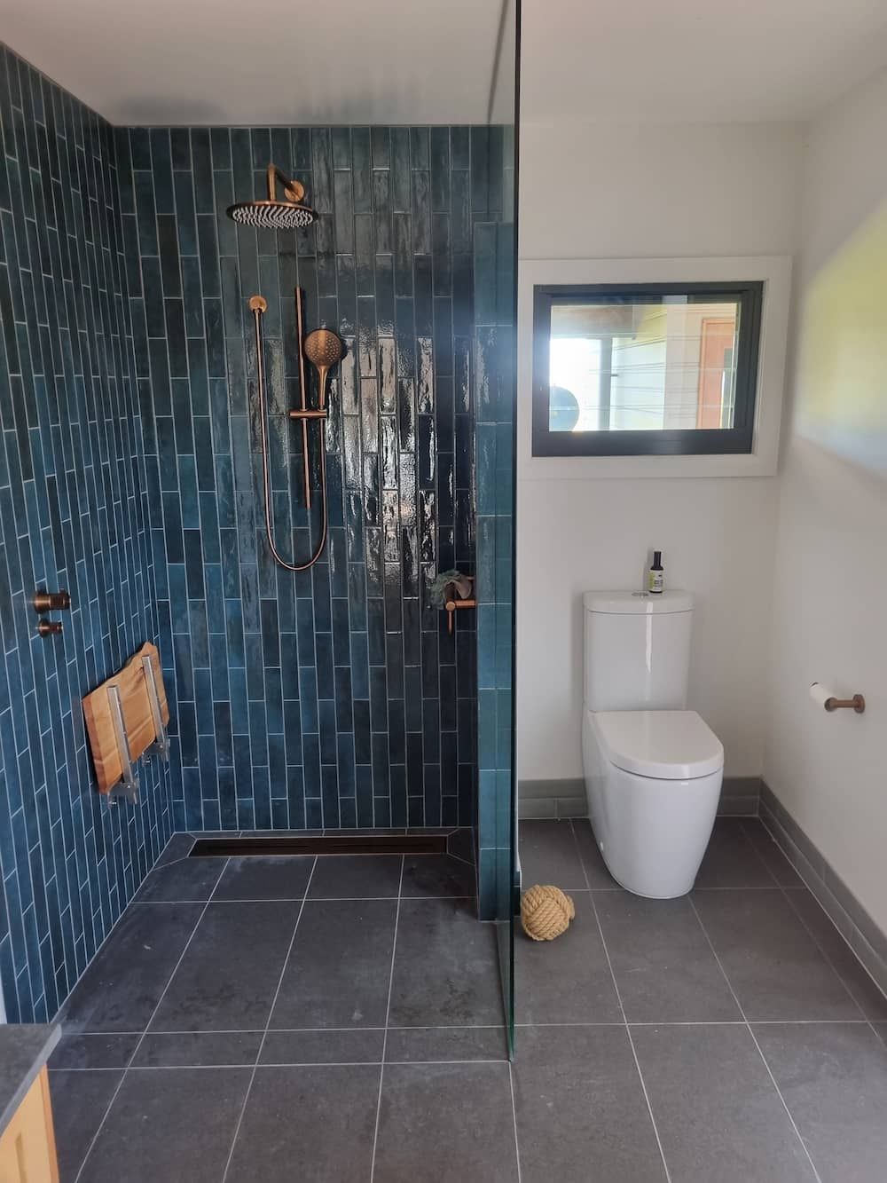 A Bathroom with A Toilet and A Walk in Shower — Origin Plumbing & Gas in Tuckurimba, NSW