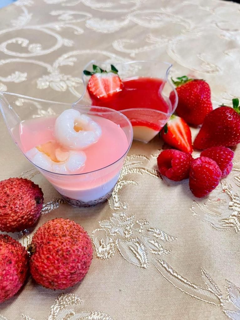 A Table Topped With Strawberries, Raspberries, and Lychees — Thai Taste Restaurant In Gracemere, QLD