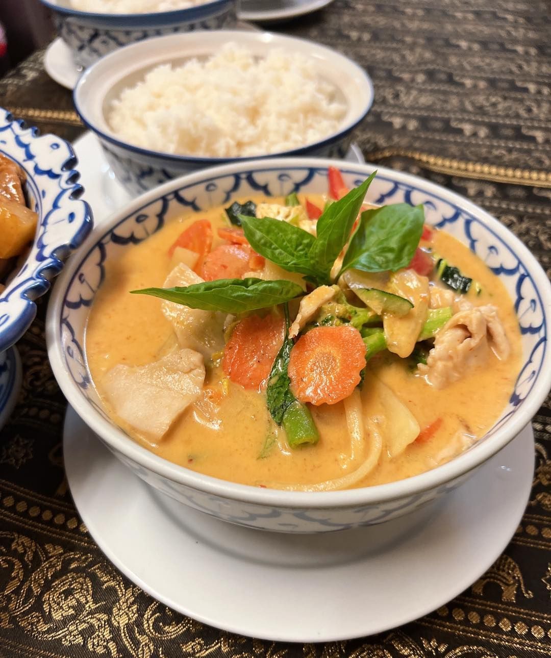 A Bowl of Soup With Carrots and Other Vegetables in It — Thai Taste Restaurant In Yeppoon, QLD