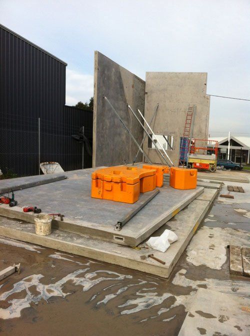 Machine being used to install wall