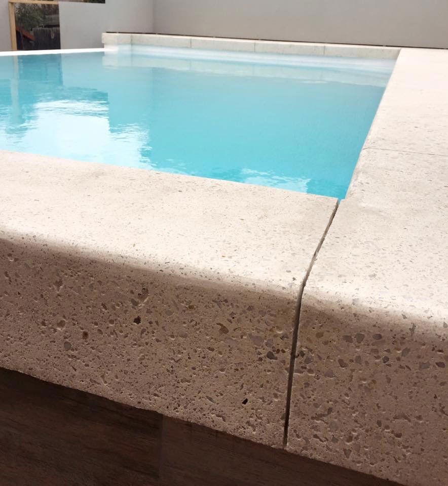View of a pool with concrete surrounding