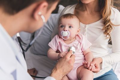 Newborn Care — Pediatrician Checking-Up on Baby in Bedford, NH