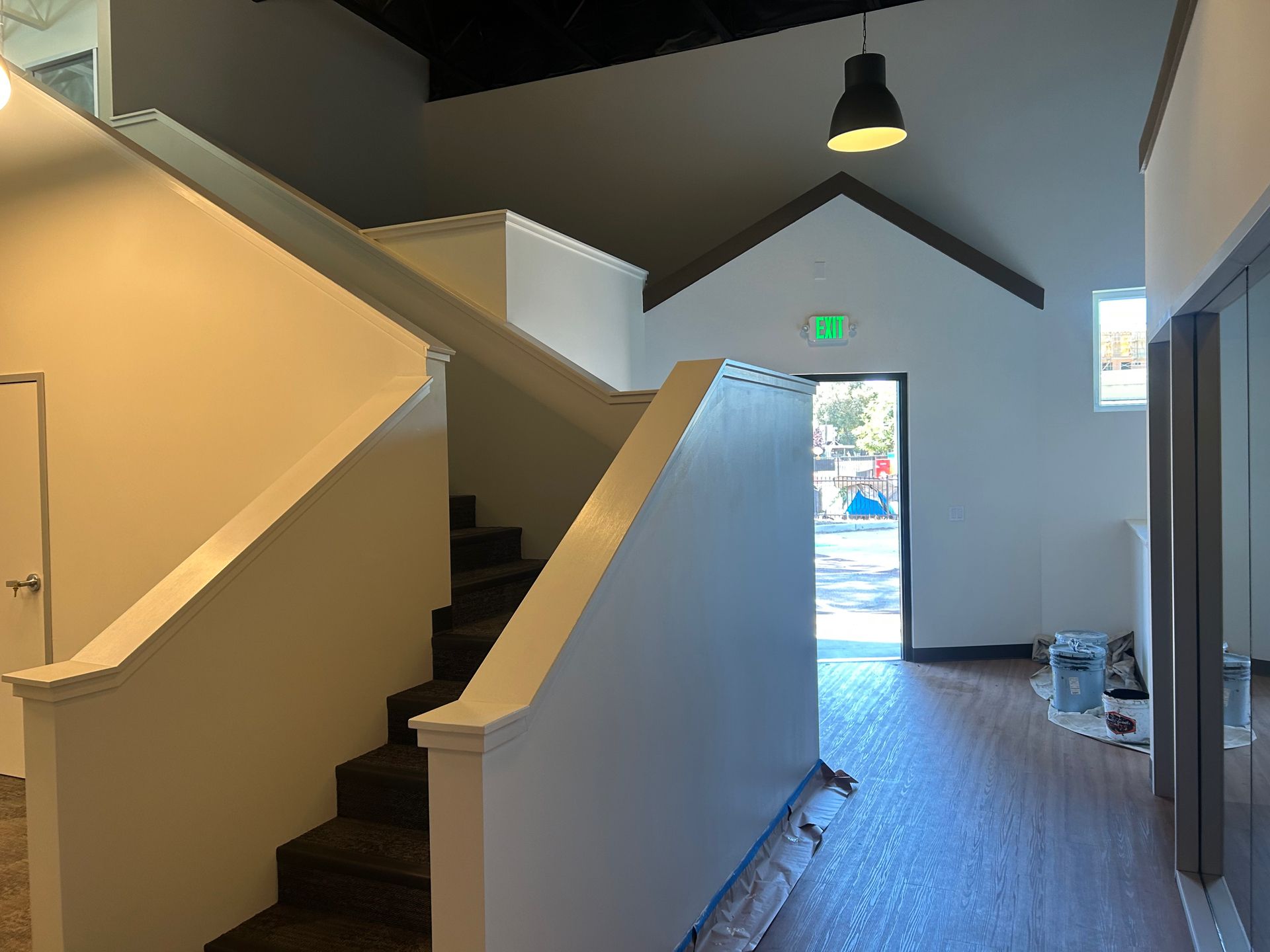 A man is loading boxes into a white van