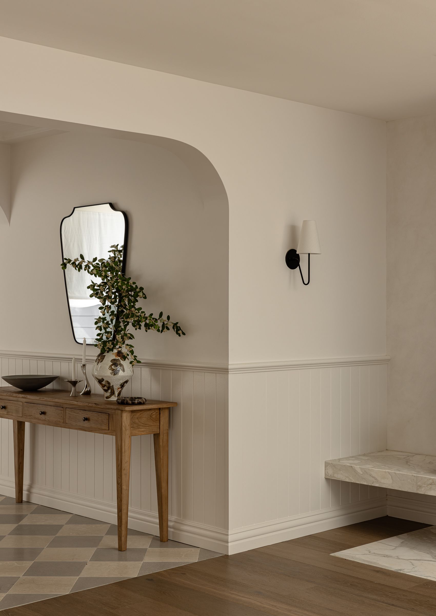 Interior With a Wooden Console Table, Mirror, and Sconce — SDC Building Design In Kiama, NSW