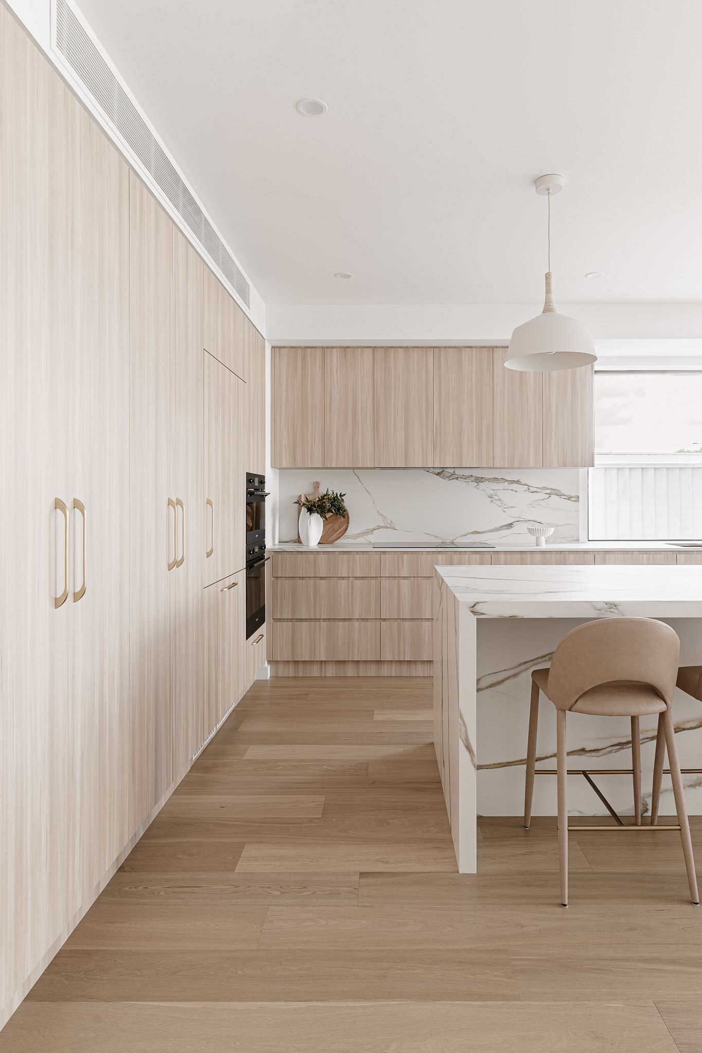Modern Kitchen With Light Wood Cabinets — SDC Building Design In Kiama, NSW