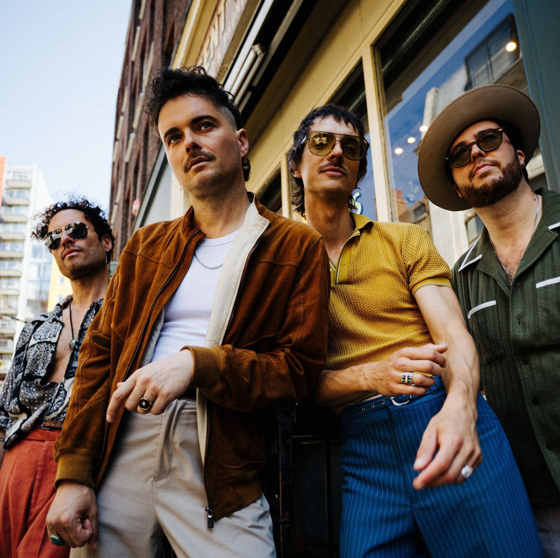 A group of men standing next to each other 