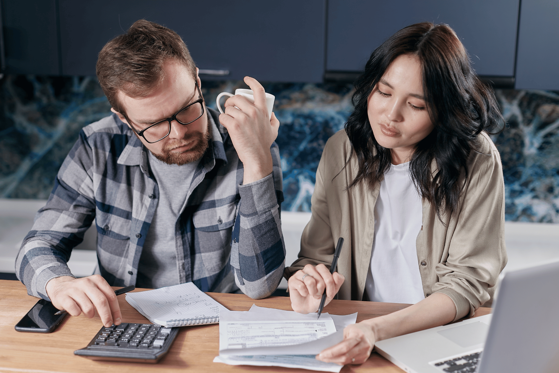 couple reviewing annuity options and retirement income strategies at home