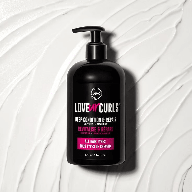 Black bottle of Love Ur Curls deep conditioner with a pump top, set against a white, textured background.