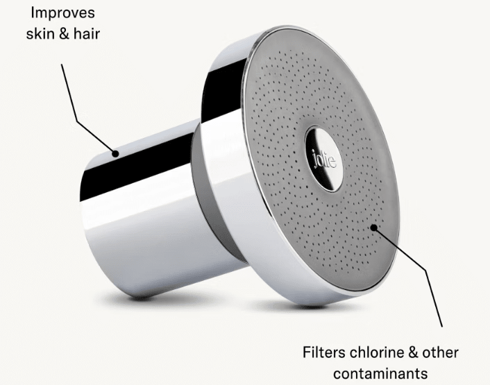 Shiny chrome shower head; filters contaminants, improves skin and hair.