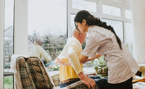 Female Care Assistant Helps The Elderly — Cullman, AL — Checklist Concierge Service, LLC