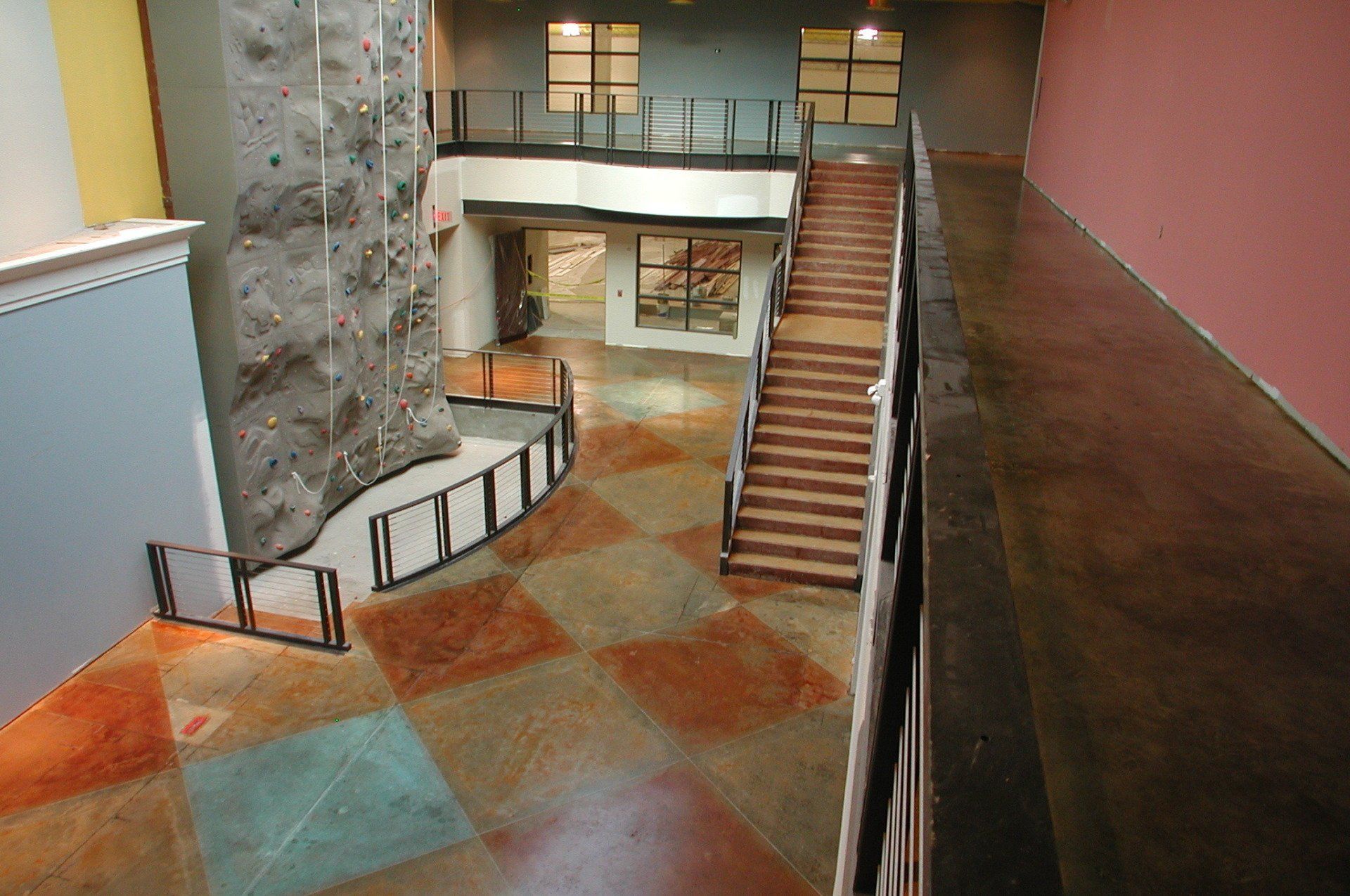 An aerial view of a building with stairs and a climbing wall
