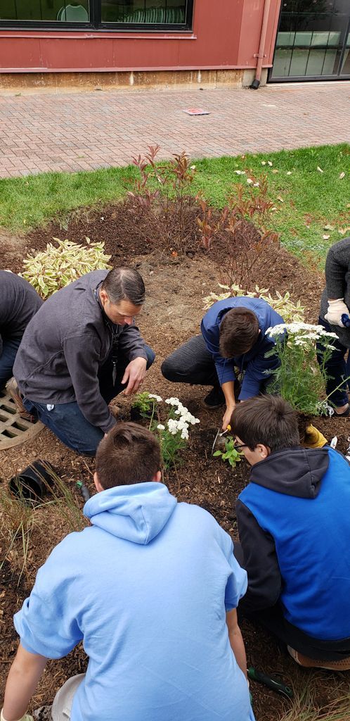 Students learning about plant spacing.