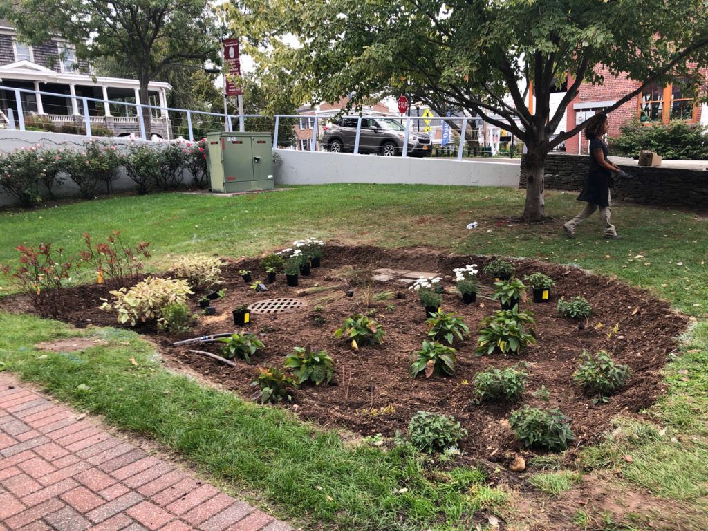 Added standing platform for signage so that visitors could enter the garden.