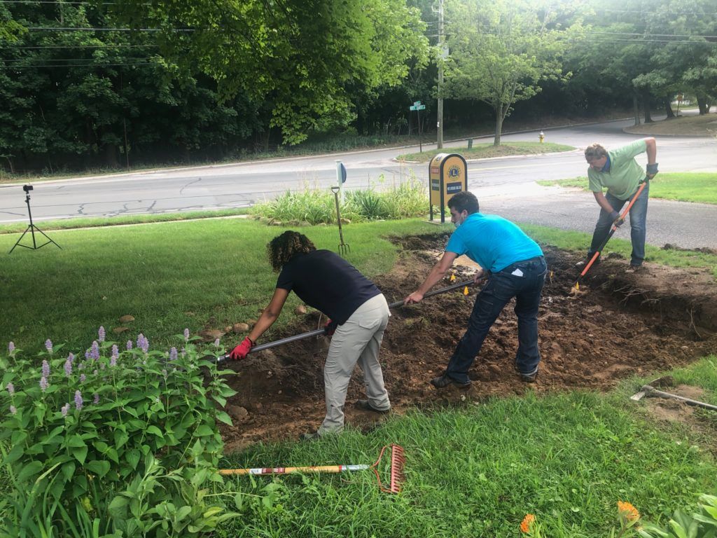 Leveling the planting bed.