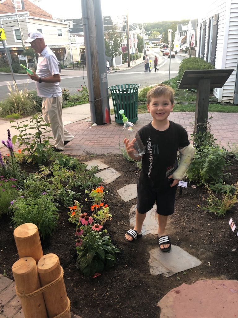 Guests can grab a watering bottle and water the garden