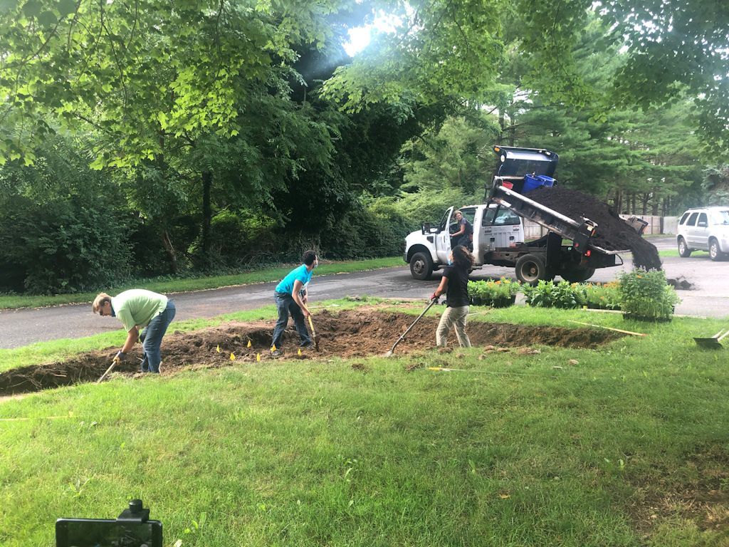 Compost and mulch arrives.