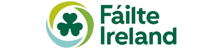 A logo for failte ireland with a clover on it