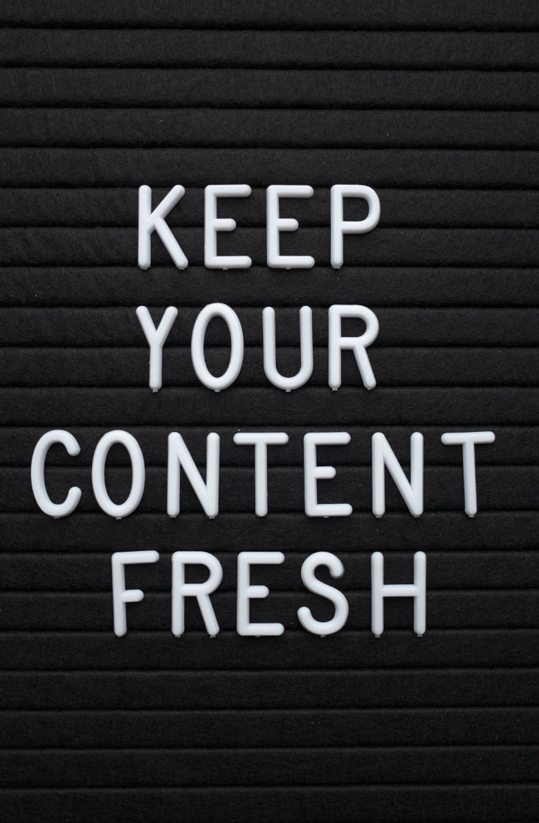 A black letter board that says keep your content fresh