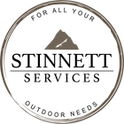 Logo for Stinnett Services with mountain graphic and text: 