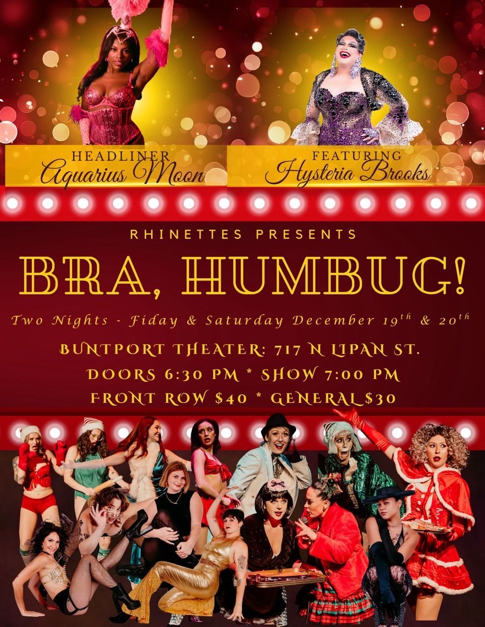 A man in a green suit and top hat is holding a cane.