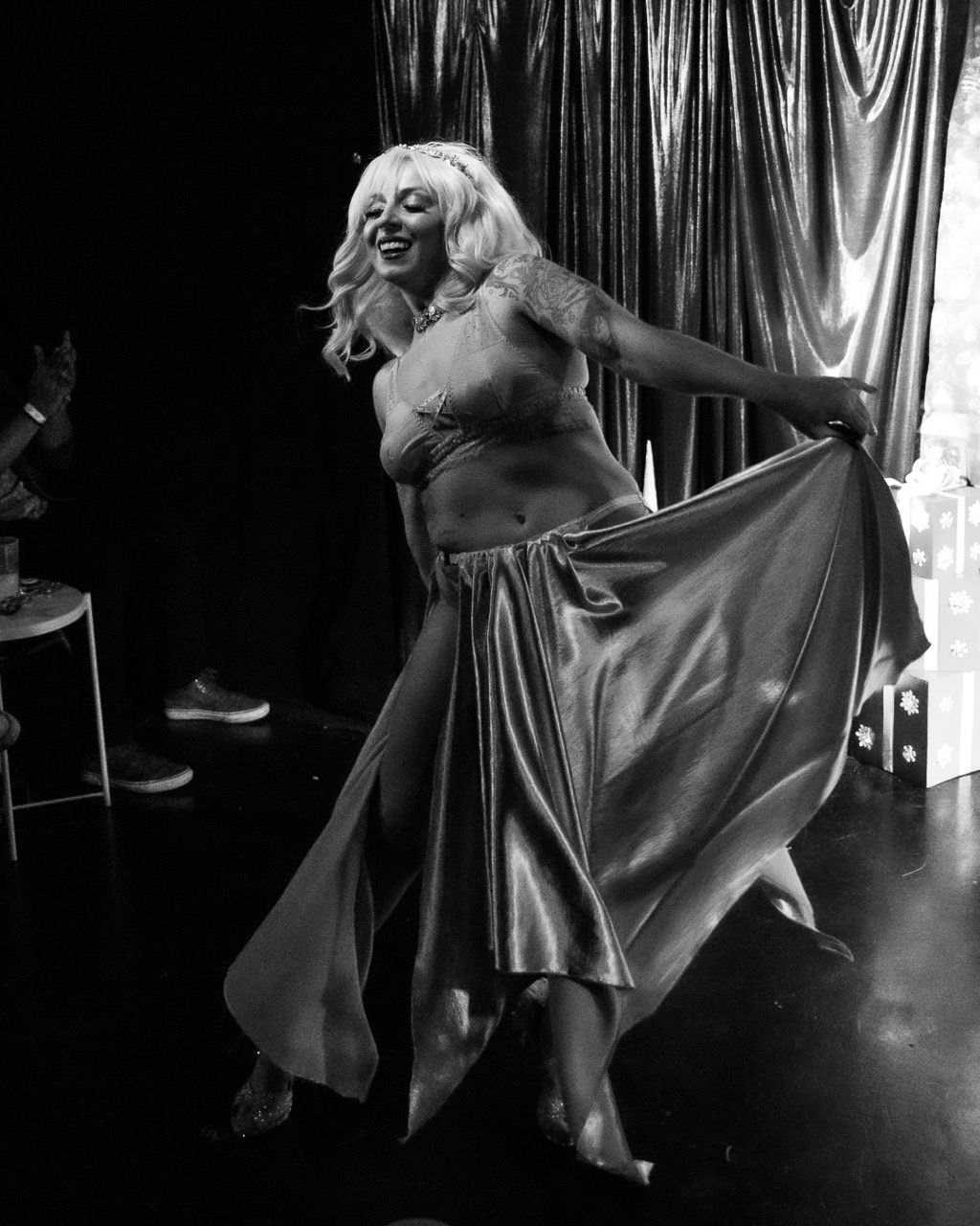 A black and white photo of a woman dancing