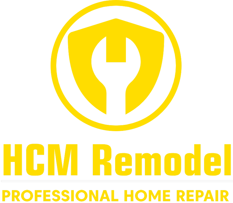 Yellow logo for "HCM Remodel". Features a wrench within a shield and circle. Text reads "PROFESSIONAL HOME REPAIR".