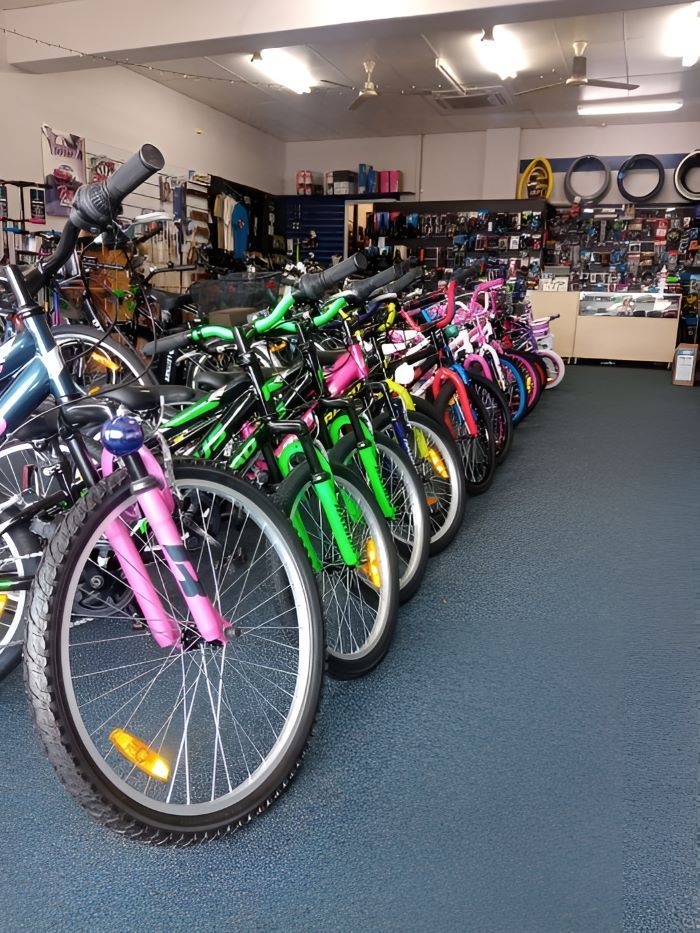 A Row of Bicycles Are Lined Up in a Store — Freedom Sports in Bundaberg Central, QLD