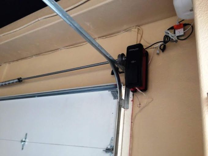 A garage door with a motor attached to it