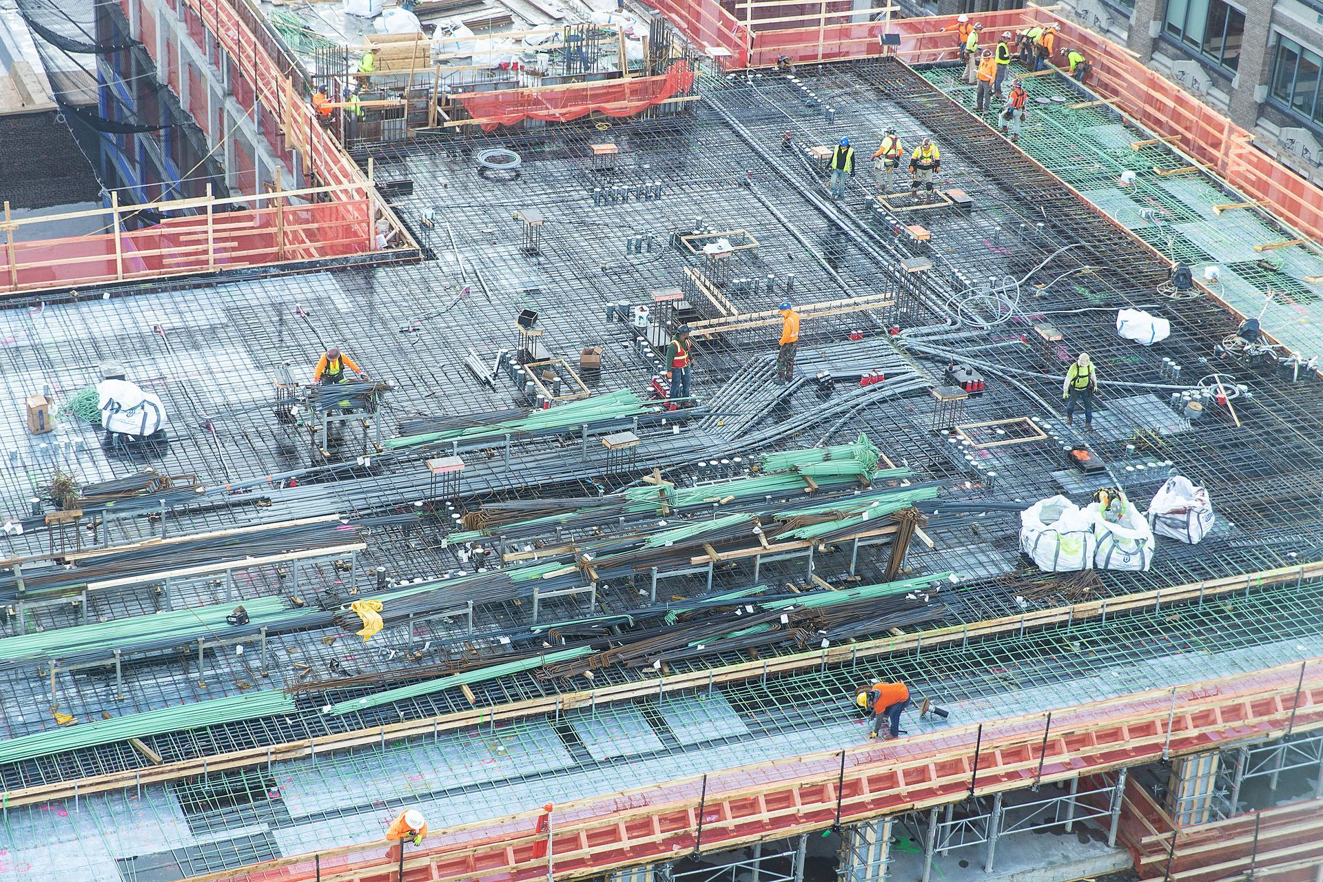 An aerial view of a construction site with workers.