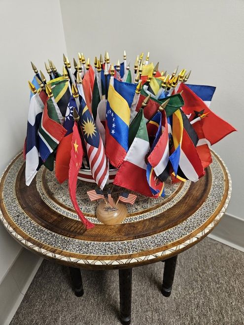 A table with a bunch of small flags on it