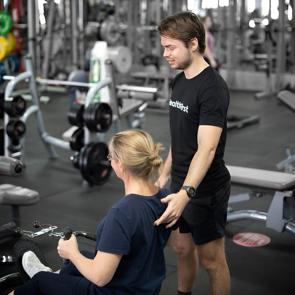 A Man in a Wheelchair is Being Helped by a Nurse β Health First Townsville In Townsville, QLD