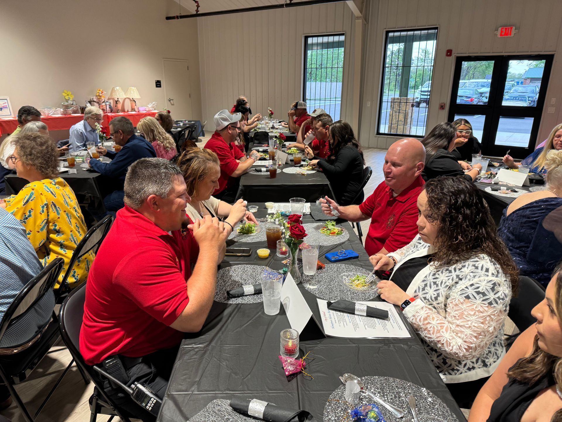 Click to enlarge City of Stilwell volunteer firefighters and spouses filled three tables at the 2026 Hometown Heroes Banquet.