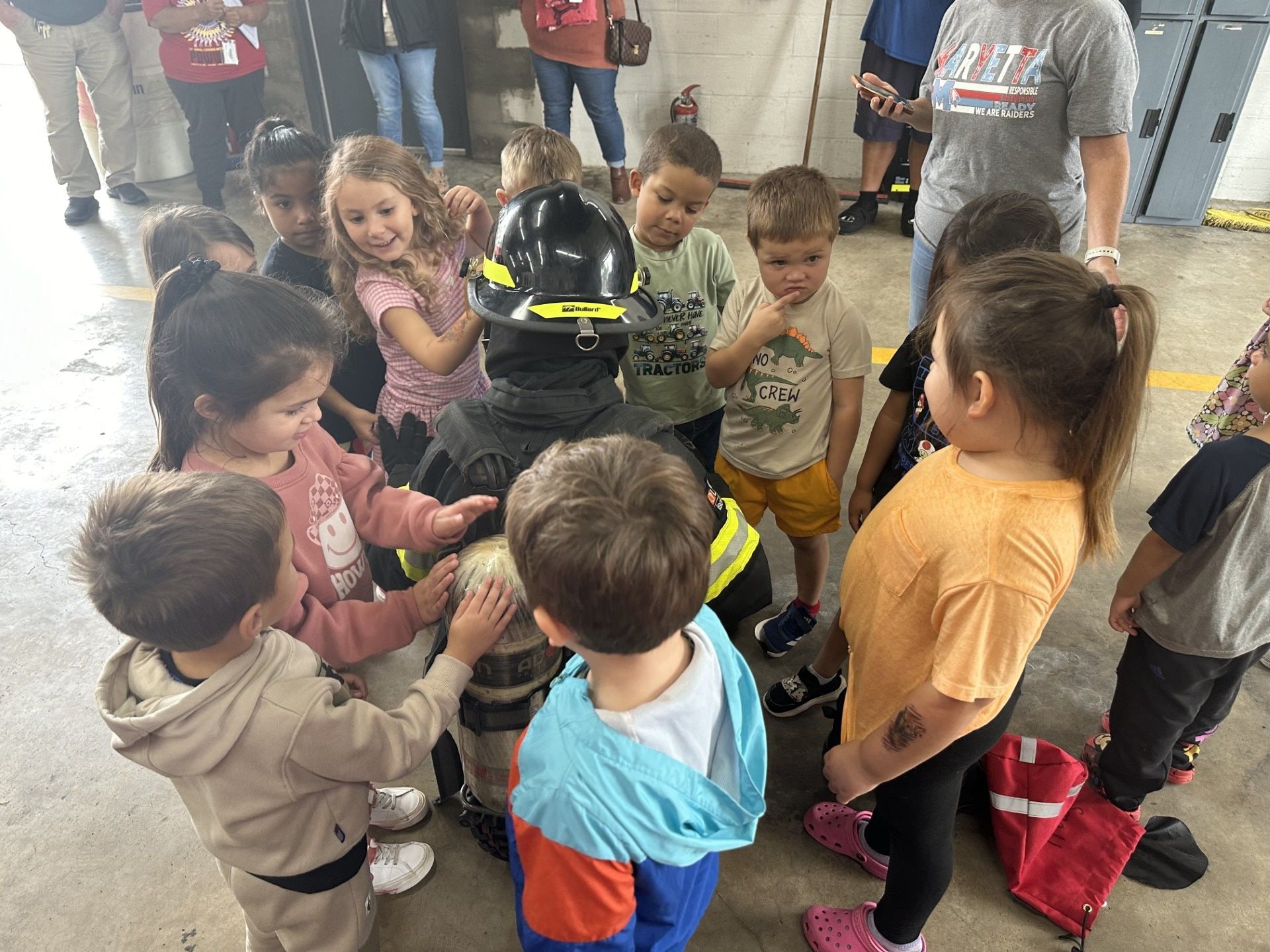 Livi Scott, firefighter EMT, entertains and educates Patty Fredricks' pre-K class from Maryetta School, at Stilwell Fire Department.