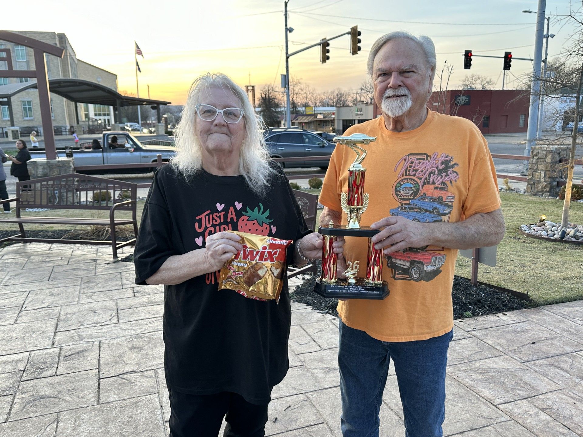 Ron Braly receives a trophy from Mayor Jean Ann Wright