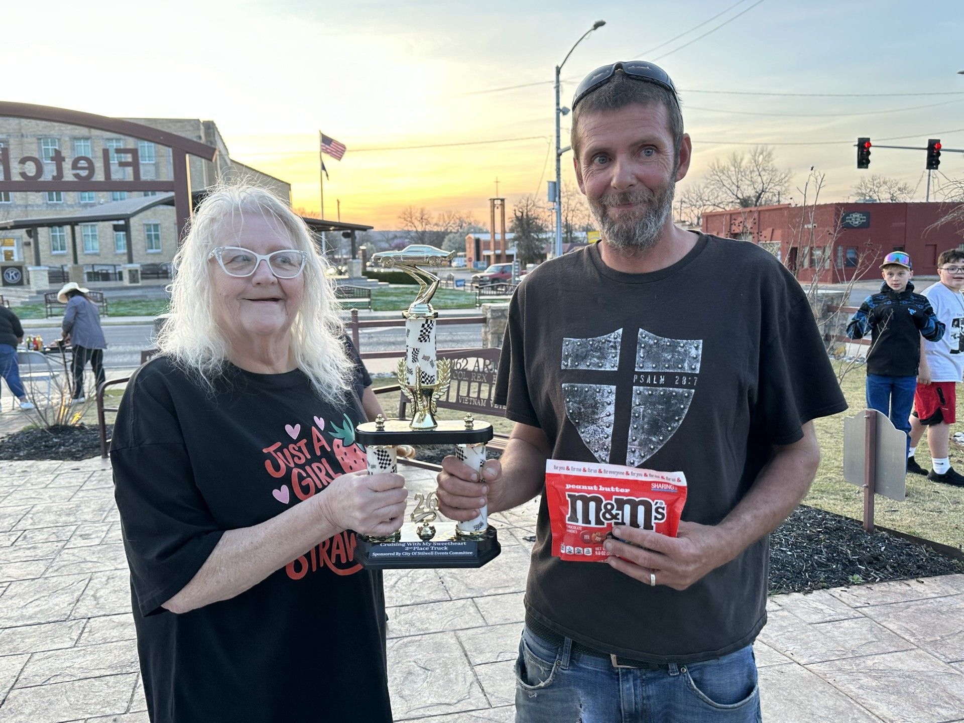 Mayor Jean Ann Wright awards a trophy to David Loman