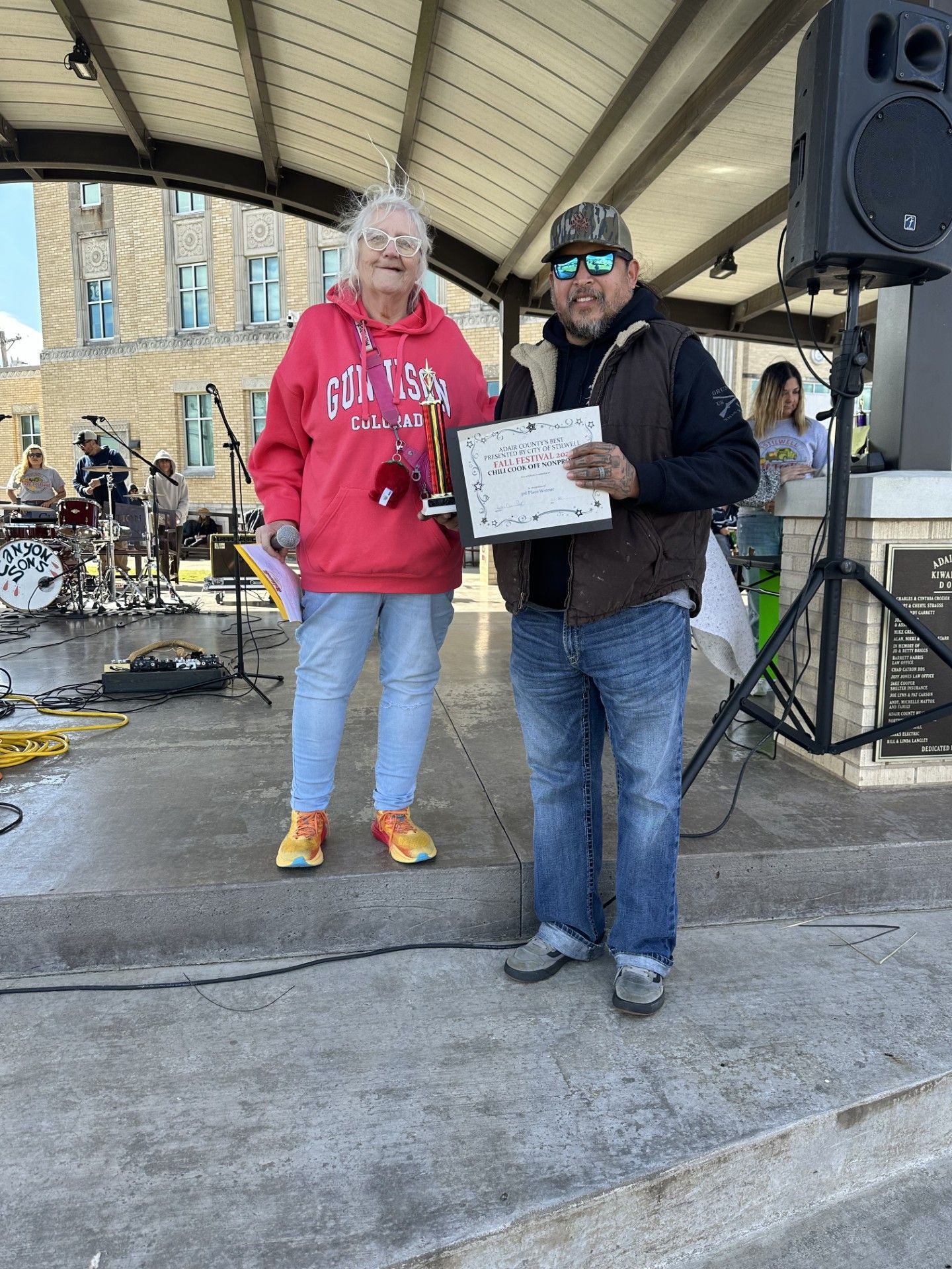 Ike Merchant is shown receiving his award from Mayor Jean Ann Wright