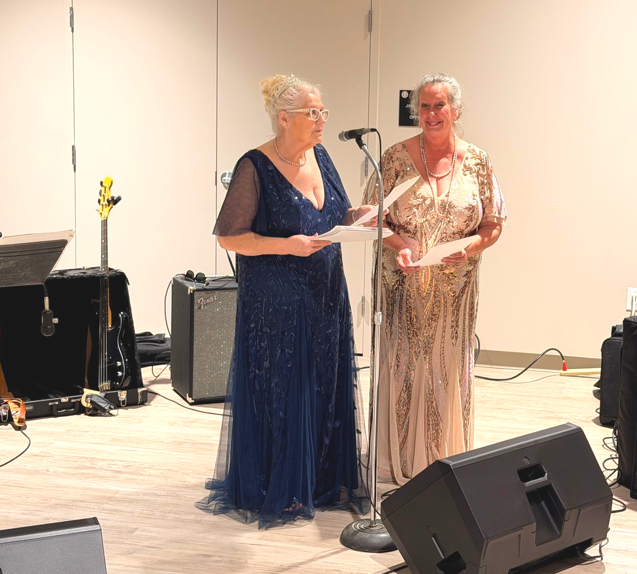 Mayor Jean Ann Wright and Renee Fite announcing winners of the Silent Auction.