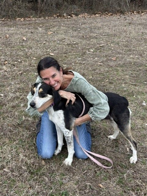 Women Holding a dog