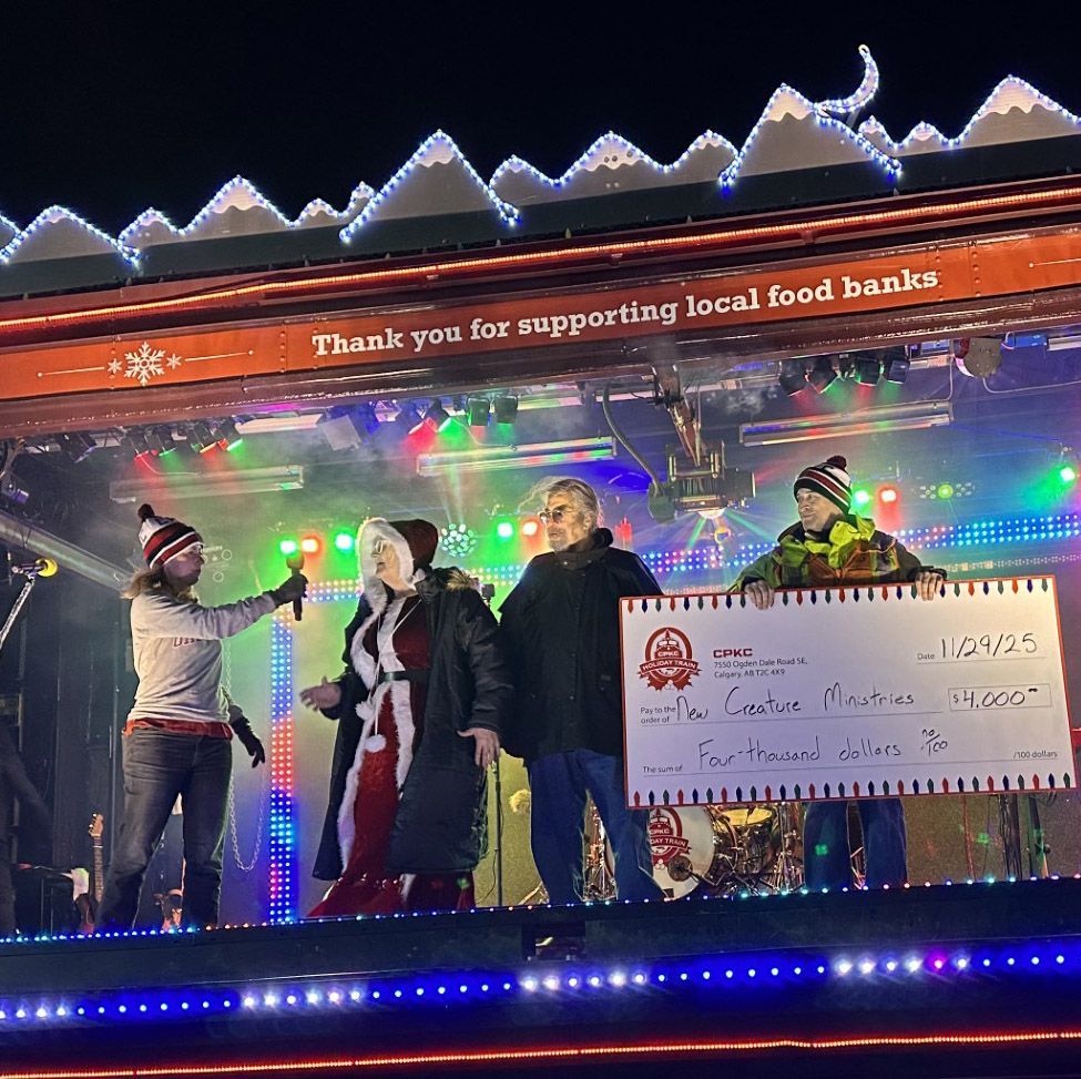 J.J. Wilde, Mayor Jean Ann Wright, Sean Wright and a railroad representative on stage