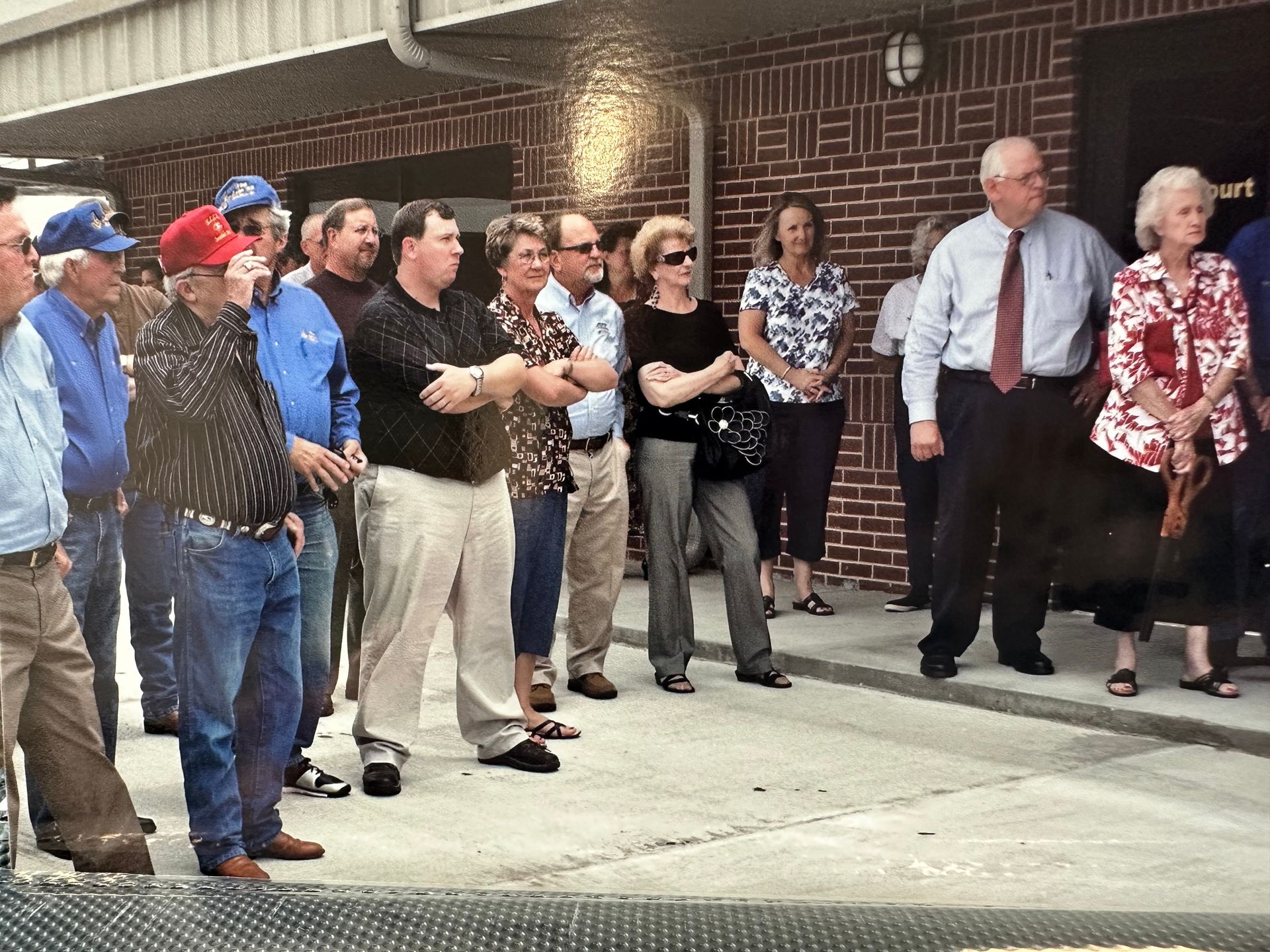 Police and other Stilwell residents celebrating new police station opening