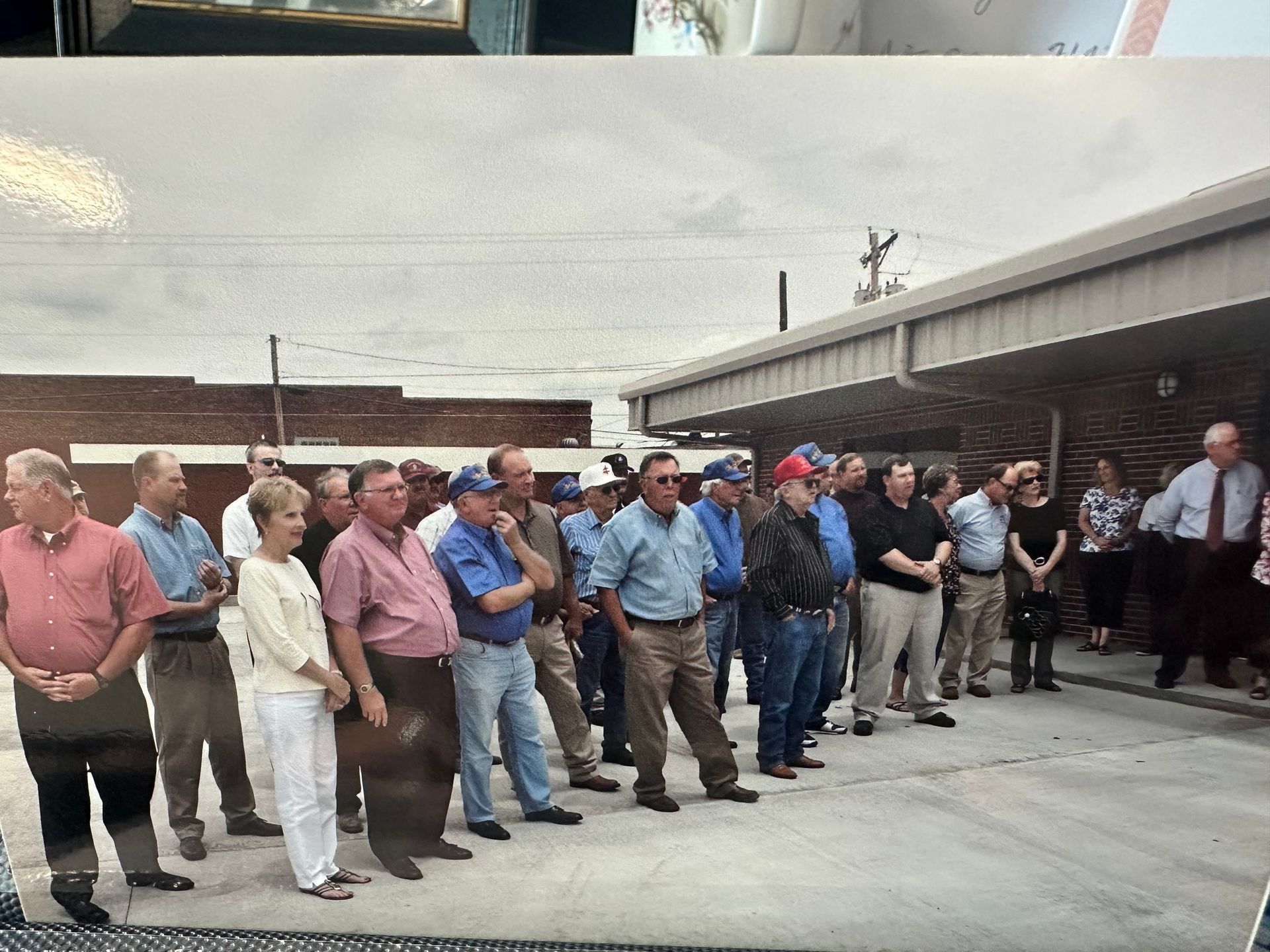 Stilwell residents gathering at the historic police station opening