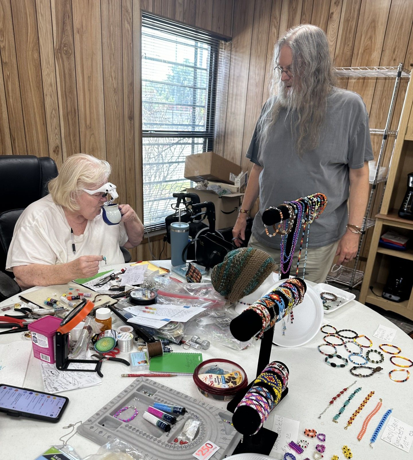 At the Community Building, making beaded jewelry is one of the popular projects.