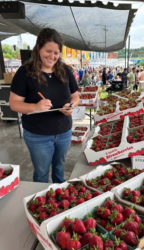 Shelby Mendoza, Payne County OSU Extension Educator,is shown judging the berries on Saturday.